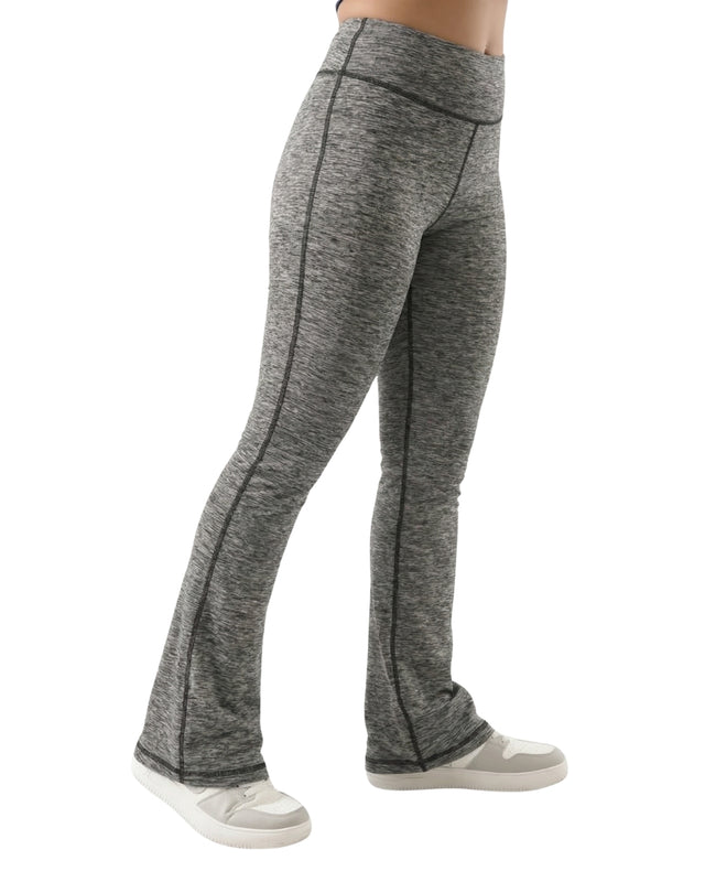 Gray leggings worn by a person on a white background