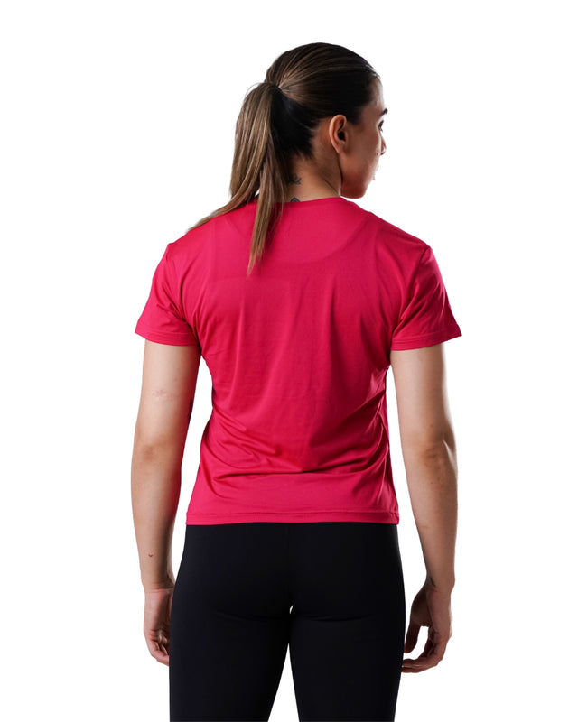 Person wearing a red athletic shirt on a white background