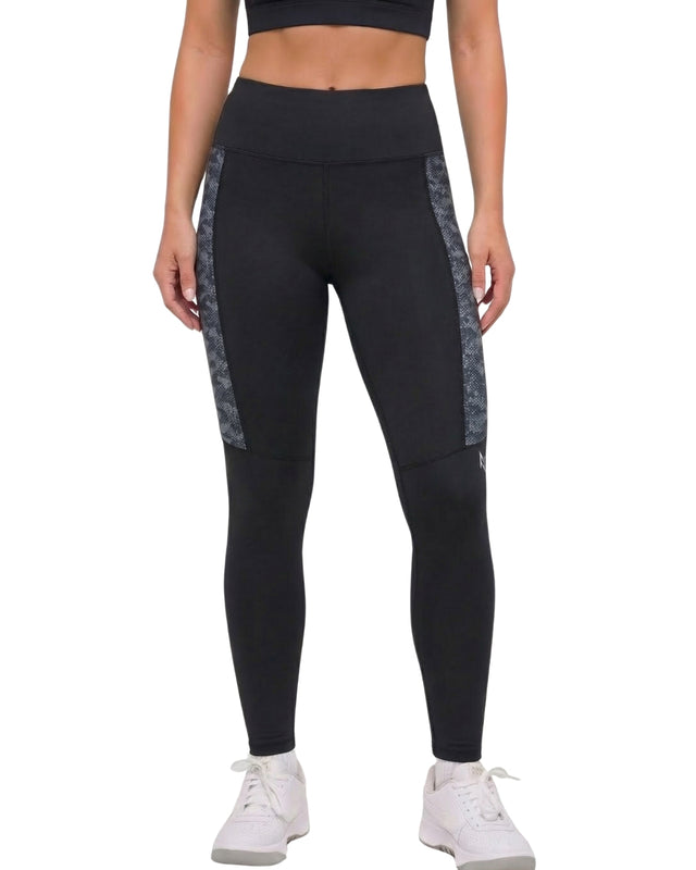 Black leggings with gray side panels worn by a person on a white background