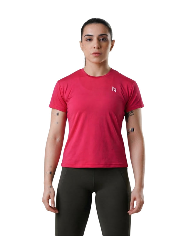 Person wearing a red athletic shirt with a logo on a white background