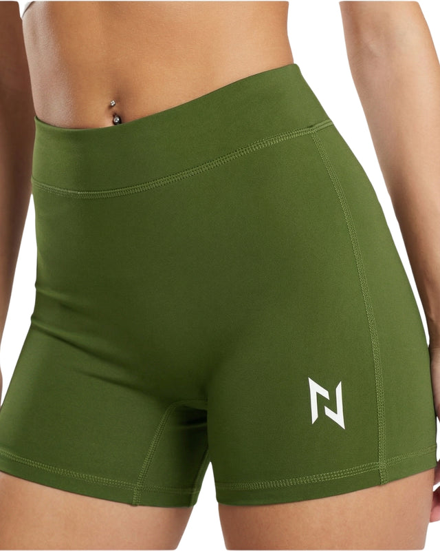 Green athletic shorts with a logo on a white background