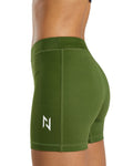 Green athletic shorts with a logo on a white background