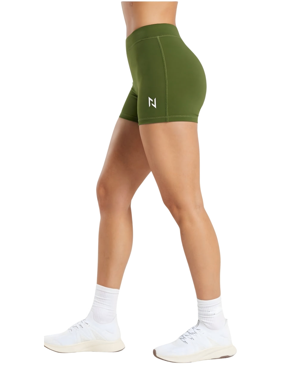 Green athletic shorts worn by a person on a white background