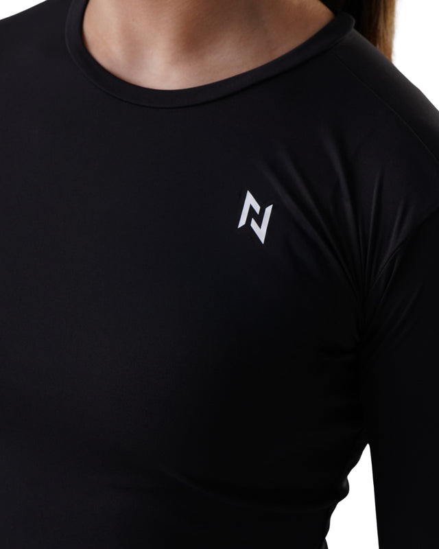 Black long-sleeve shirt with a logo on the chest against a white background