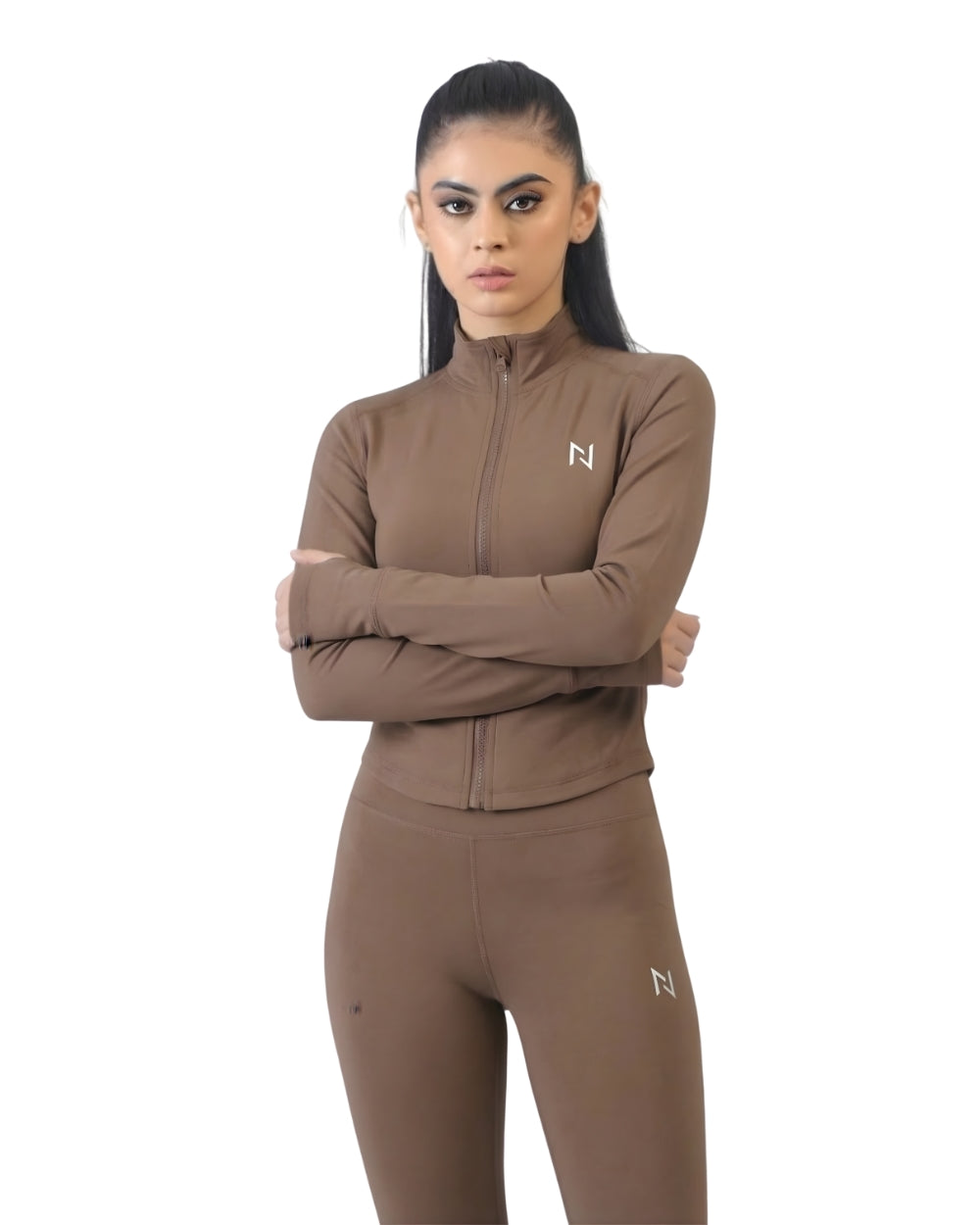 Woman wearing a brown athletic outfit with a logo on a white background