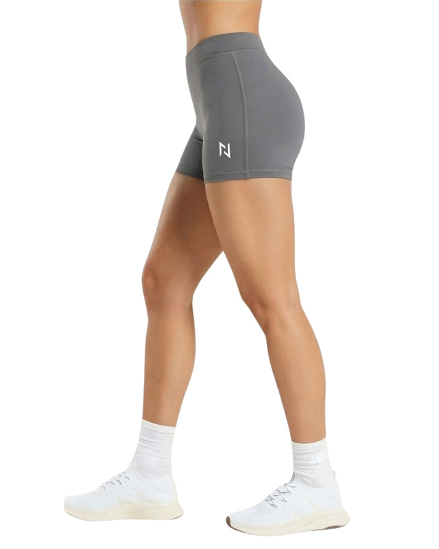 Gray athletic shorts with a logo on a white background