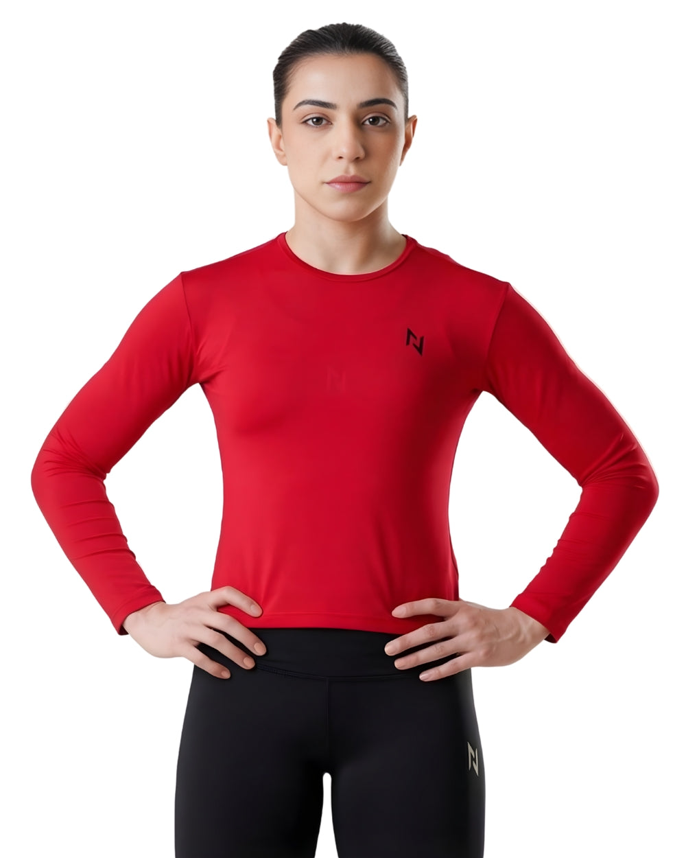 Person wearing a red long-sleeve athletic shirt with a logo on a white background