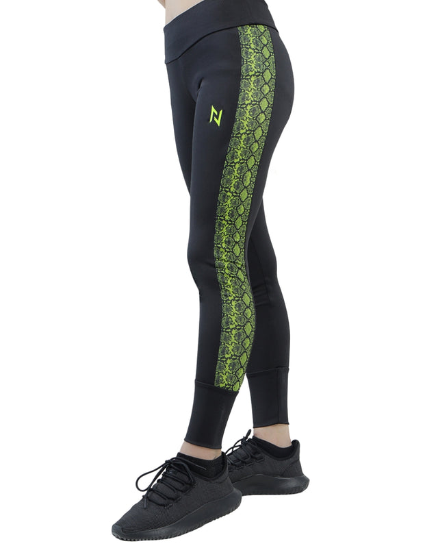 Black leggings with green snake pattern on a white background