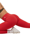 Red leggings with a logo on a white background