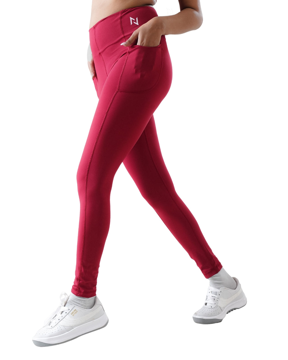 Red leggings with a logo on a white background