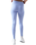 Light blue leggings worn by a person on a white background
